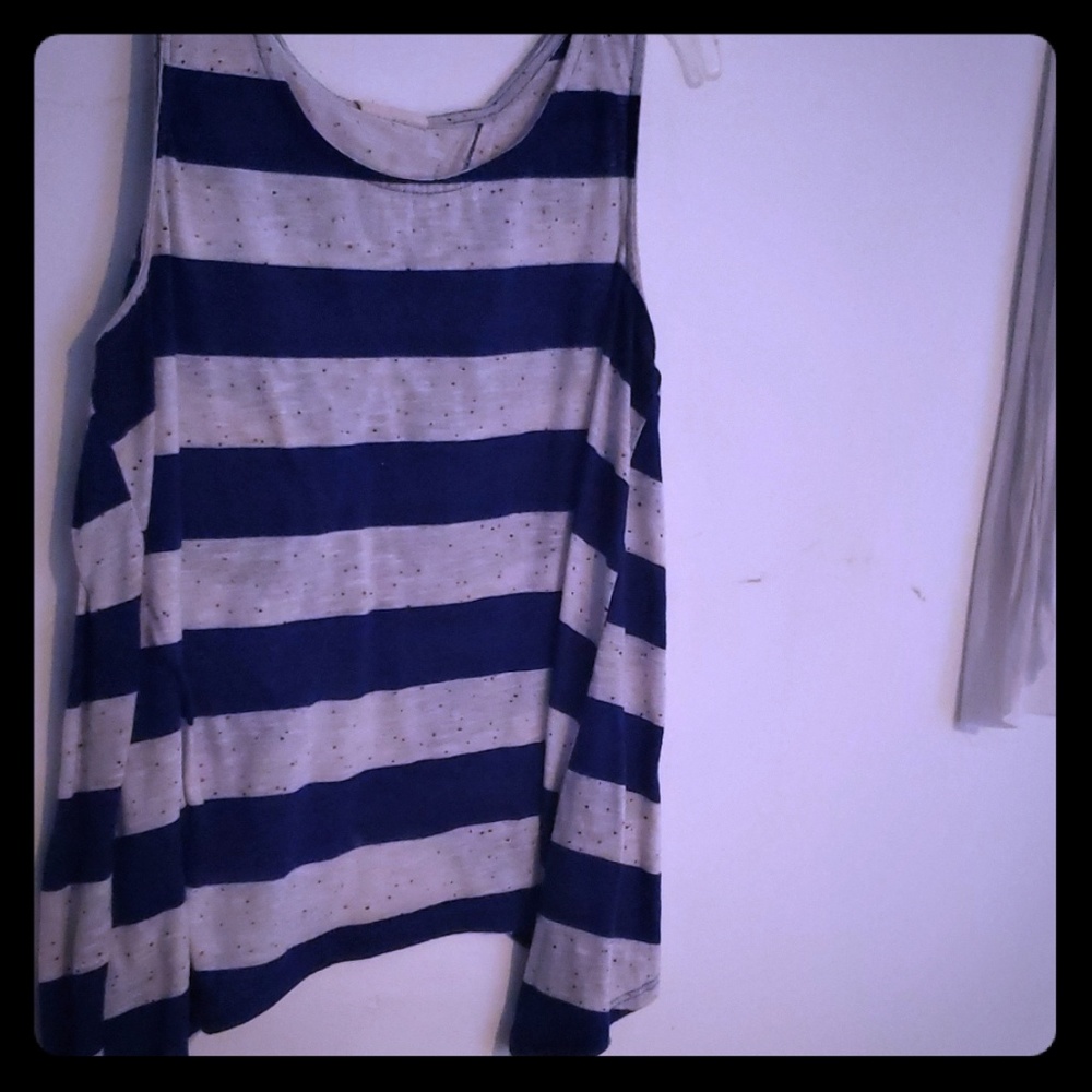 White, blue, and polka dot colored shirt